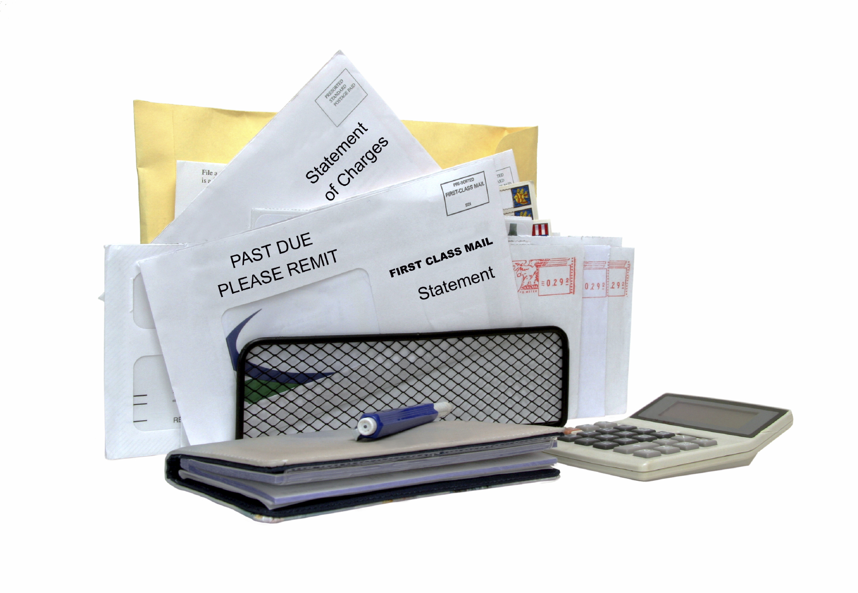 Group of unpaid bills with a cheque book, pen, and calculator.