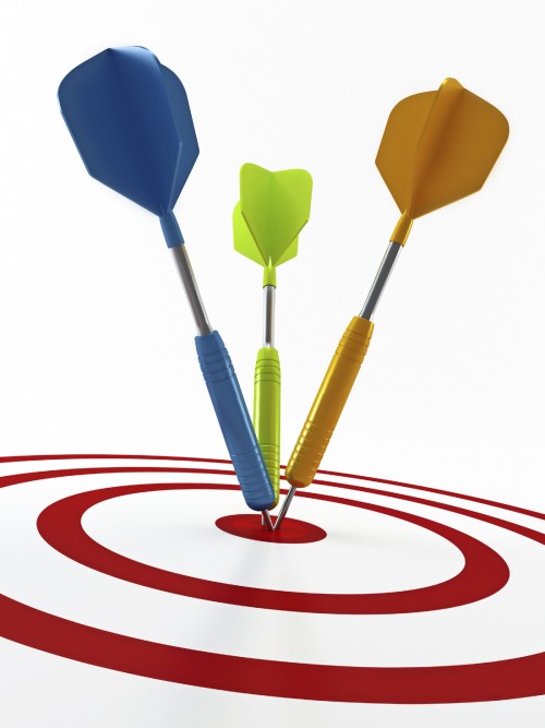 A Three darts in the middle of a bullseye