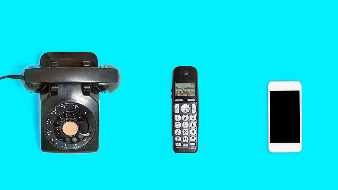 Rotary telephone, wireless landline phone and an iPhone