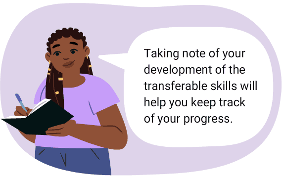 A person writing in a notebook