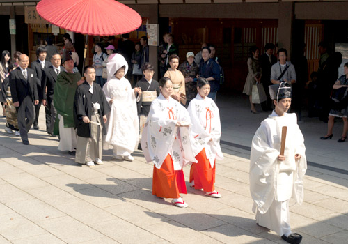 A solemn procession during the traditional Japanese wedding ceremony 