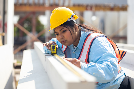 Several construction workers on a building site.
