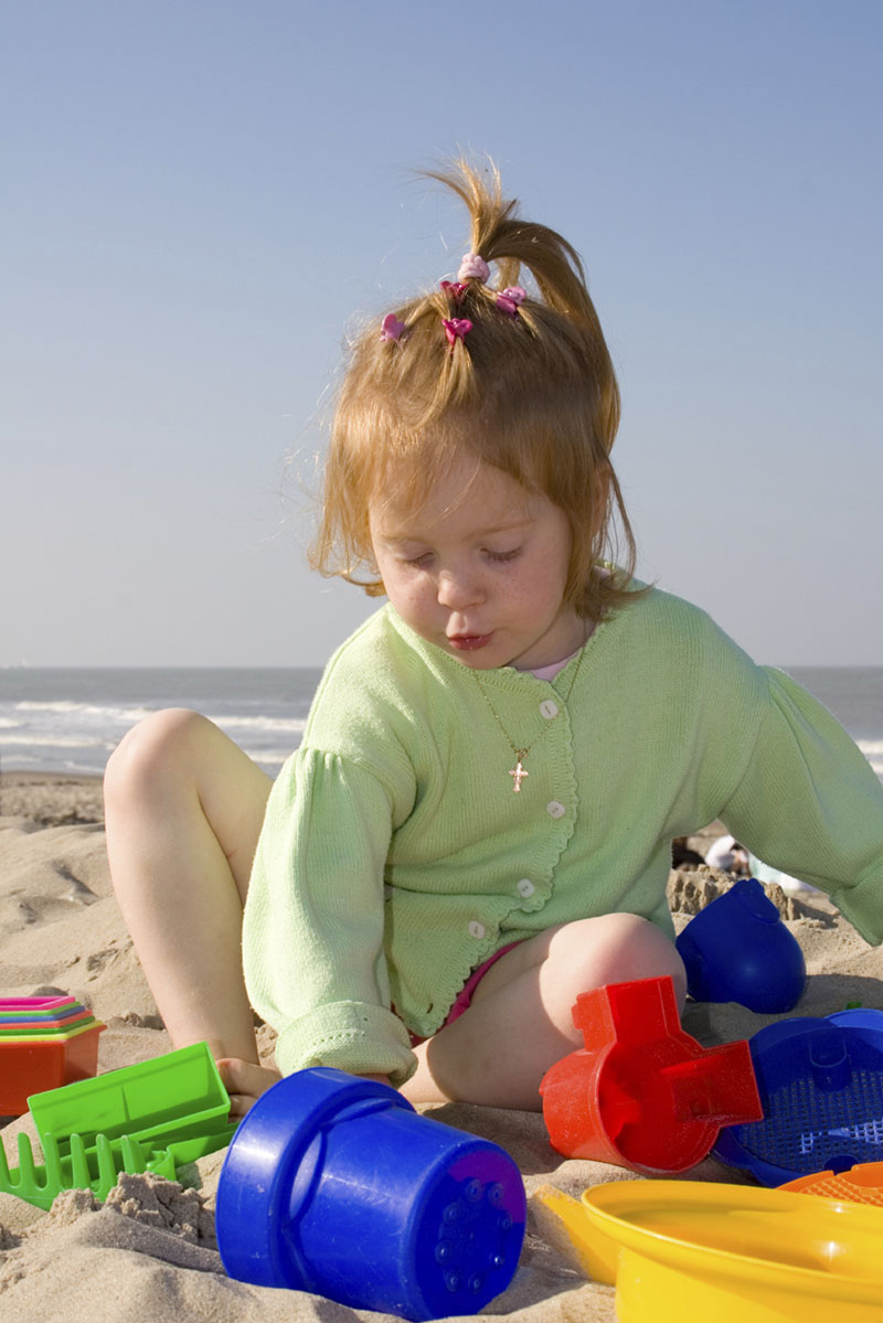 Toddler with her favourite toys