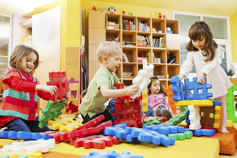 Preschool children playing together